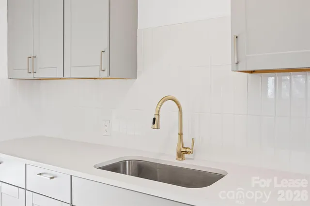 a close view of a sink and tap