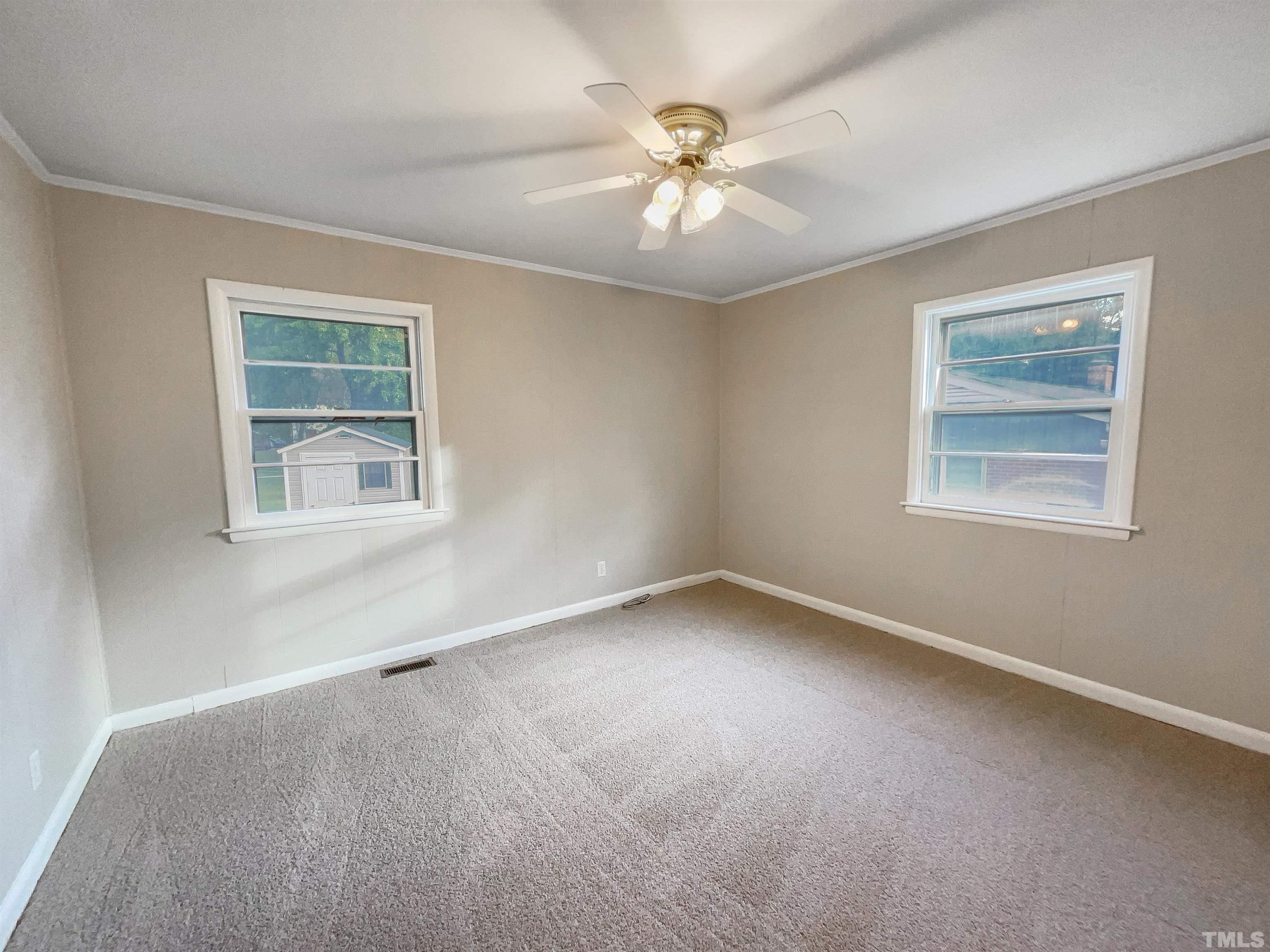 2905 Bardwell Road Raleigh, NC 27604 - Photo 11 of 17 a view of an empty room with a window