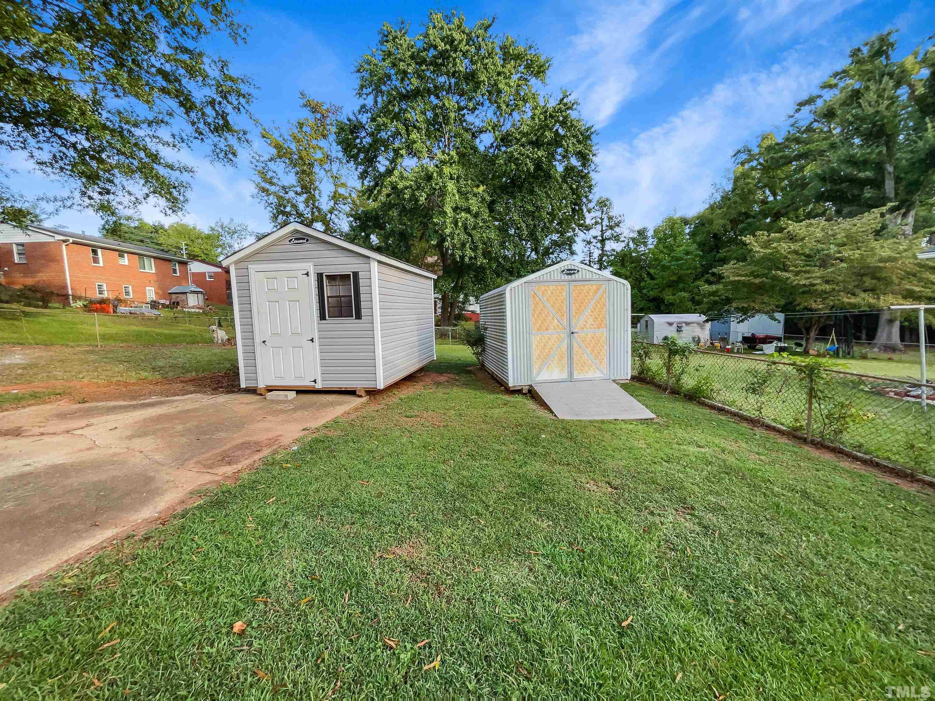 2905 Bardwell Road Raleigh, NC 27604 - Photo 14 of 17 a view of a house with a yard
