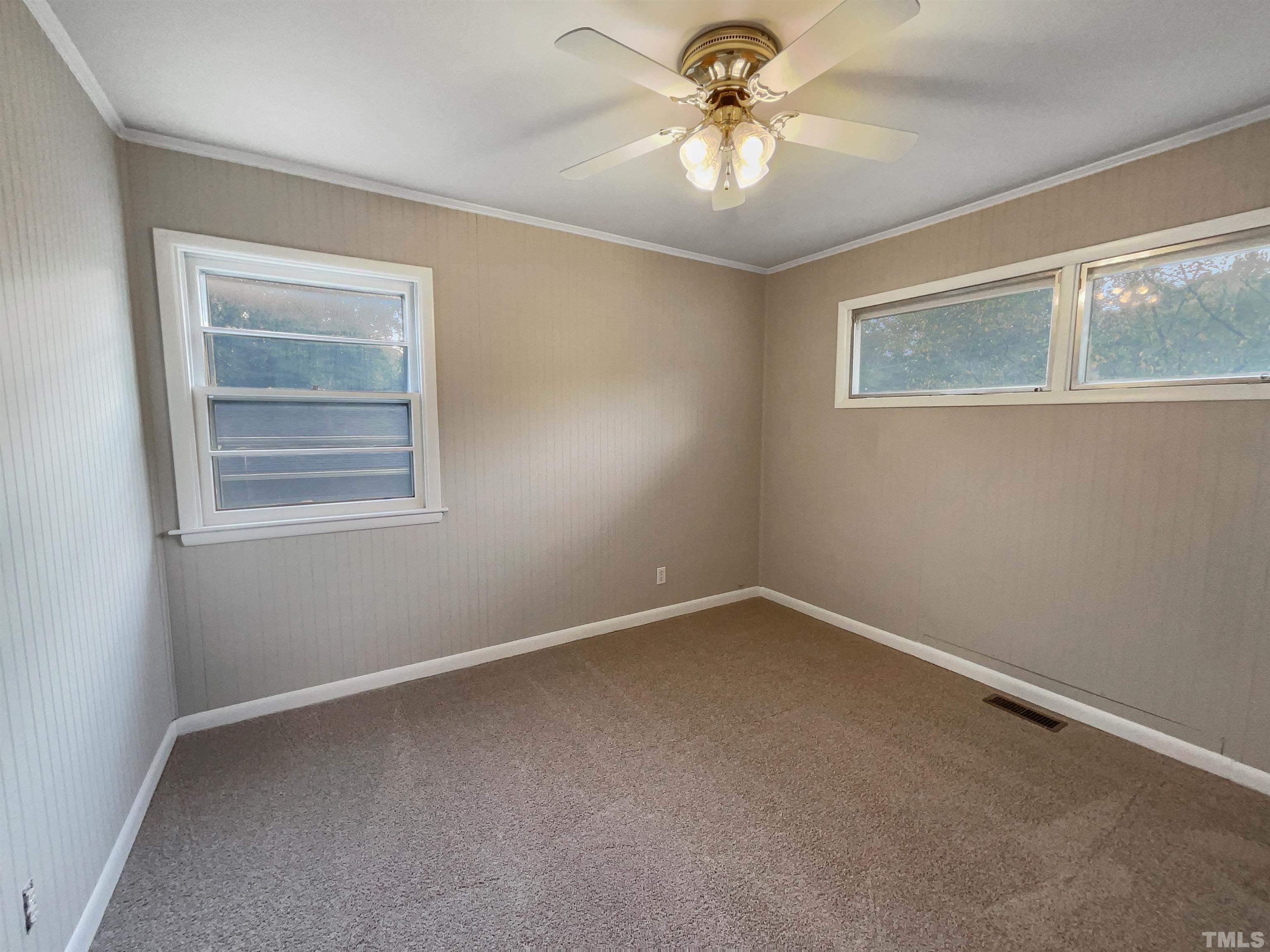2905 Bardwell Road Raleigh, NC 27604 - Photo 16 of 17 a view of an empty room with a window