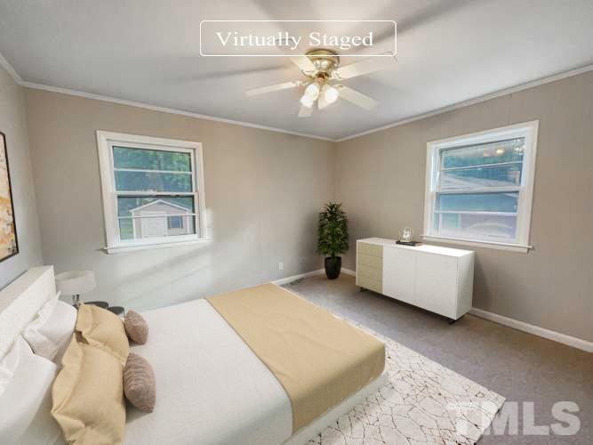 2905 Bardwell Road Raleigh, NC 27604 - Photo 3 of 17 a bedroom with a bed and window