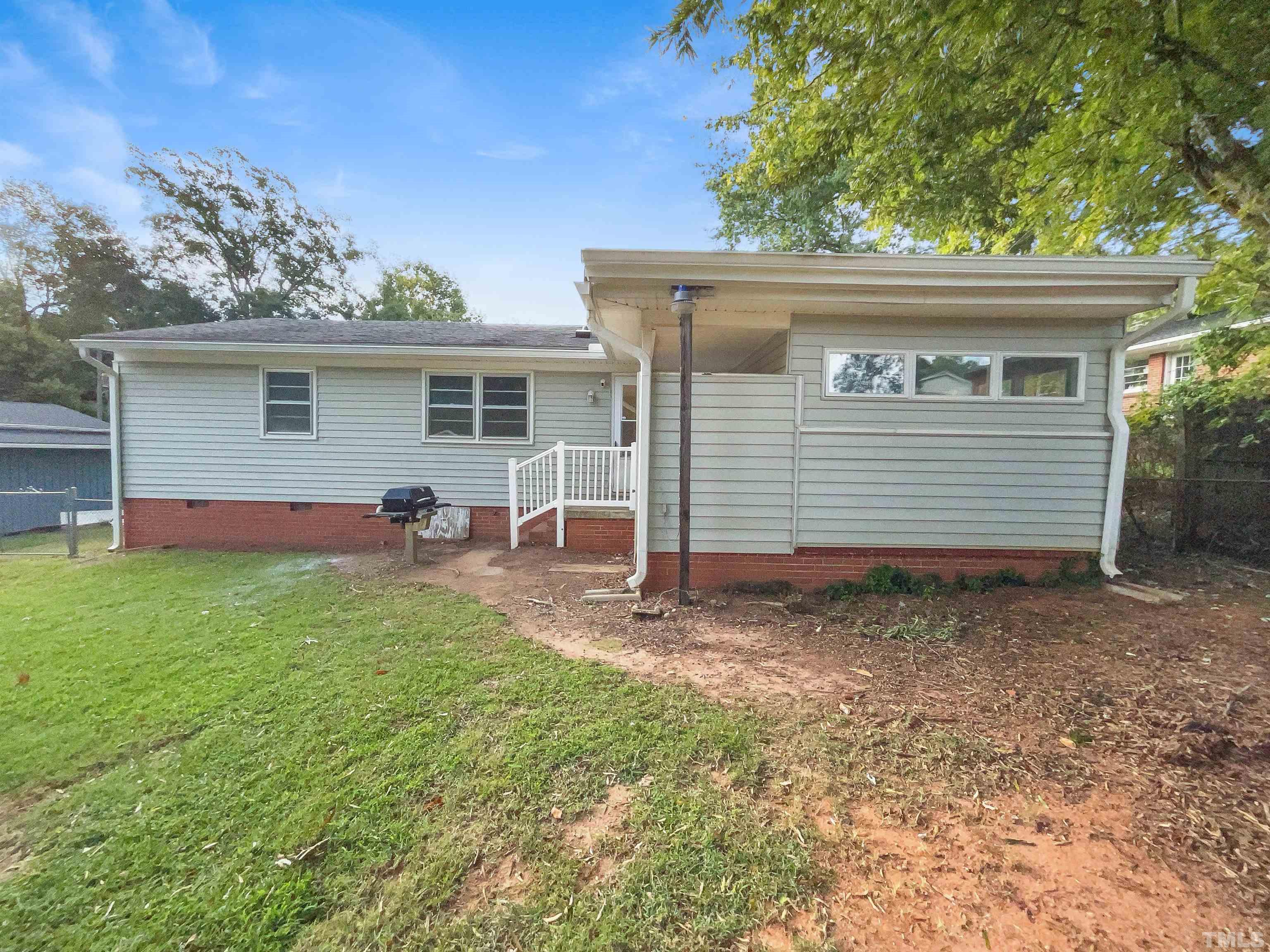 2905 Bardwell Road Raleigh, NC 27604 - Photo 7 of 17 a view of a house with a yard