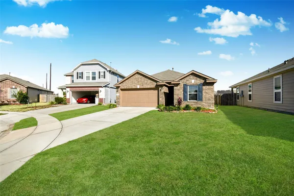 a house view with a garden space