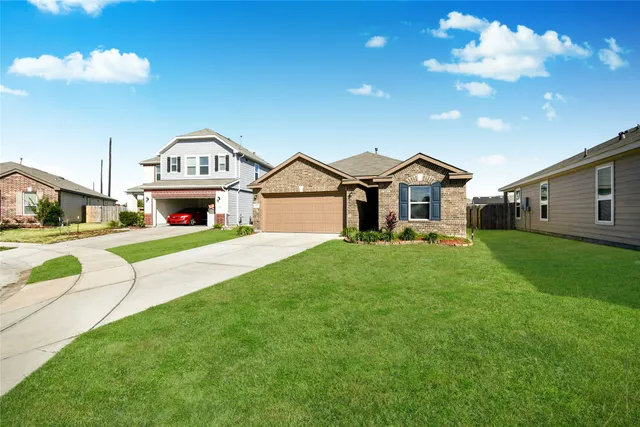 a house view with a garden space