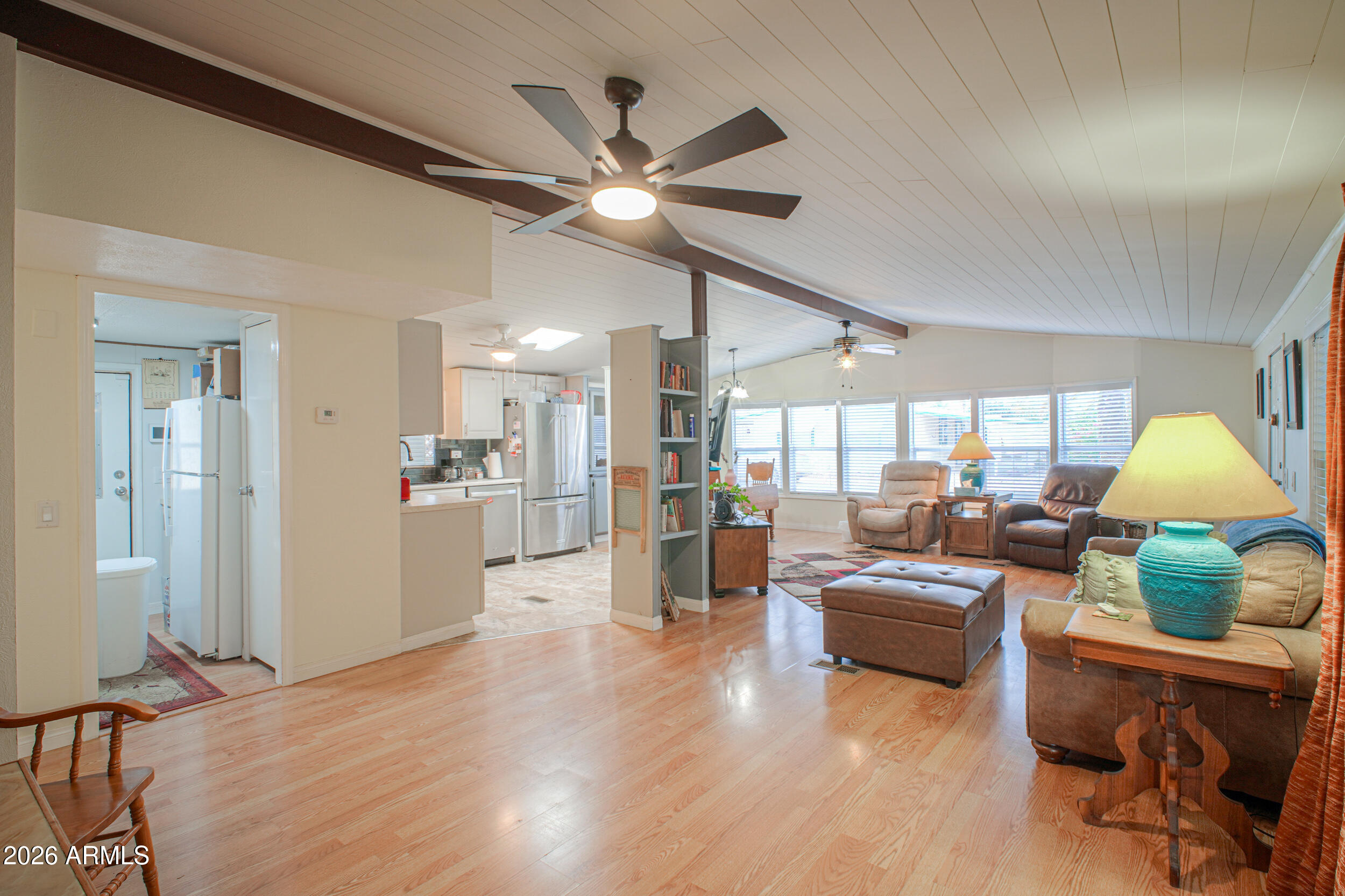 2100 North Trekell Road, Unit 290 Casa Grande, AZ 85122 - Photo 16 of 35 a living room with furniture and a chandelier
