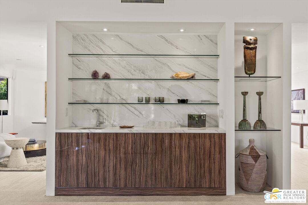 6 Trojan Court Rancho Mirage, CA 92270 - Photo 15 of 51 a room with a table and chair