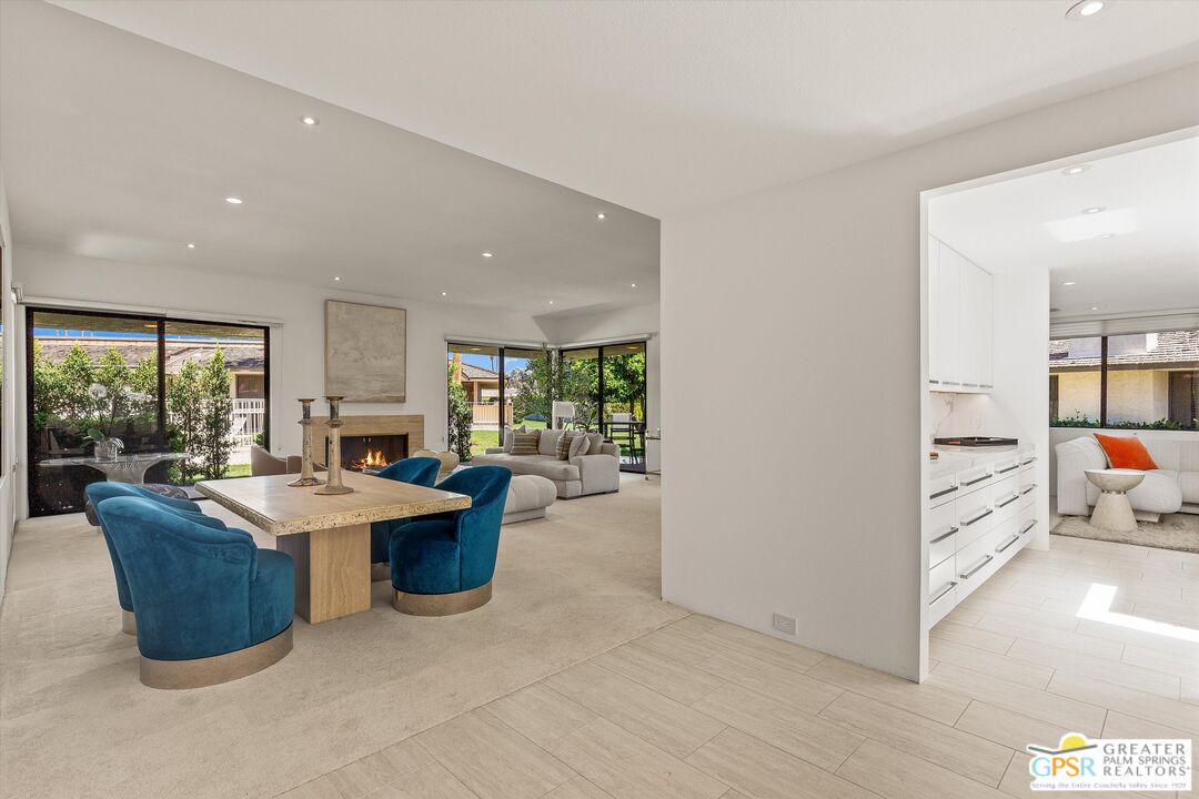 6 Trojan Court Rancho Mirage, CA 92270 - Photo 18 of 51 a living room with furniture and a large window
