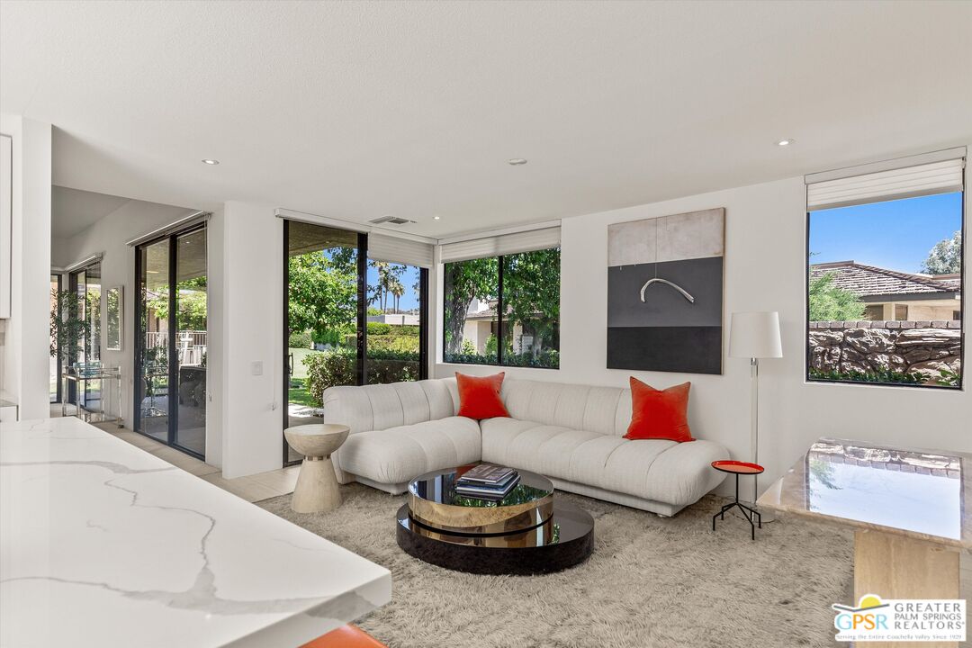 6 Trojan Court Rancho Mirage, CA 92270 - Photo 4 of 51 a living room with furniture and a potted plant