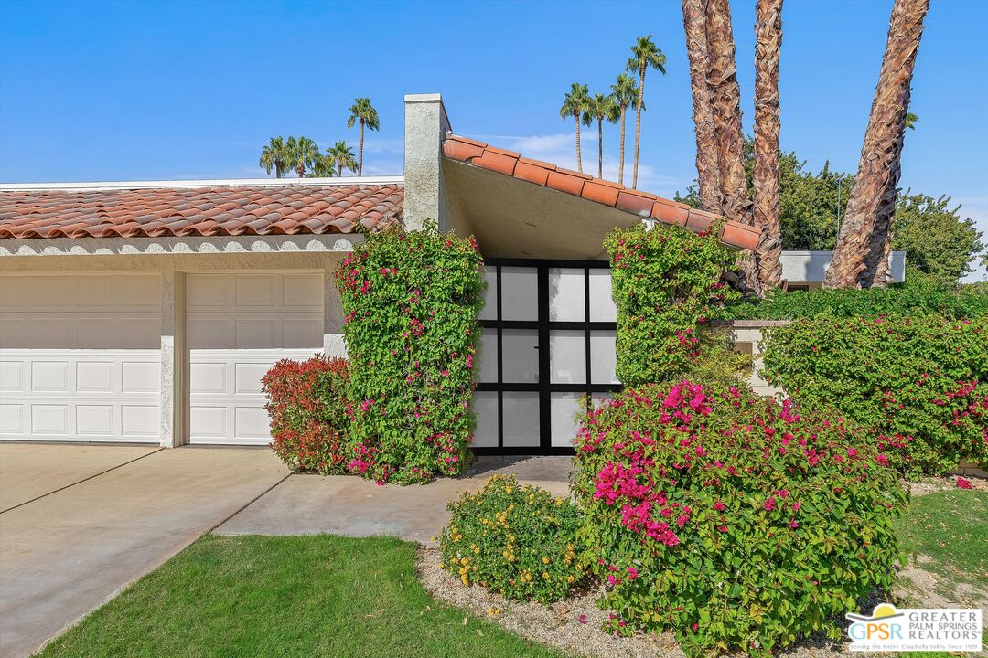 6 Trojan Court Rancho Mirage, CA 92270 - Photo 48 of 51 a house view with a garden space