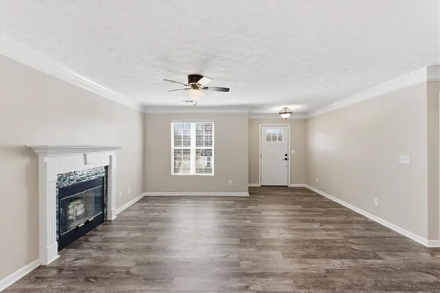 a dining room with furniture window and wooden floor