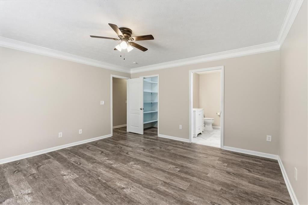 125 Governor Lane Temple, GA 30179 - Photo 29 of 57 a view of an empty room with wooden floor