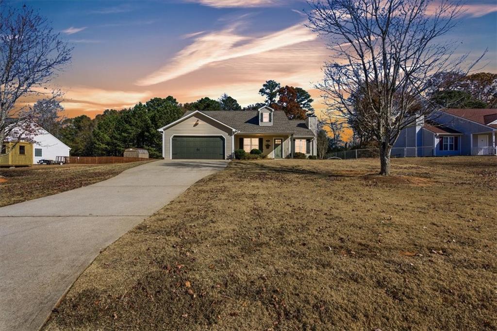 125 Governor Lane Temple, GA 30179 - Photo 3 of 57 a front view of a house with a yard