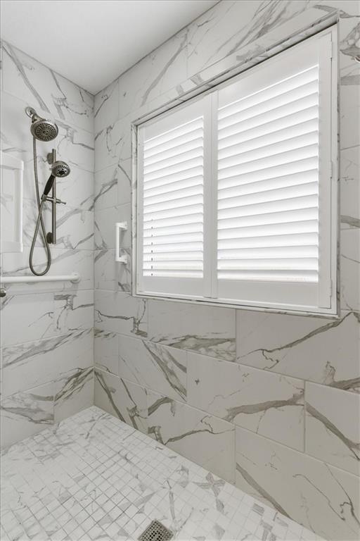 125 Governor Lane Temple, GA 30179 - Photo 34 of 57 a bathroom with a bathtub and shower