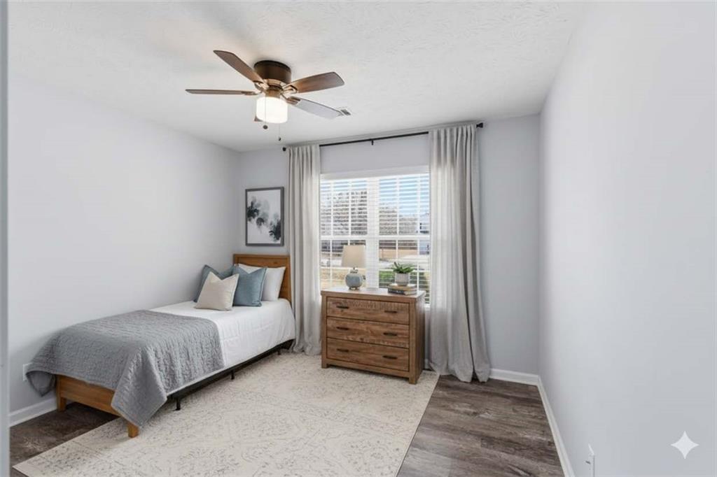 125 Governor Lane Temple, GA 30179 - Photo 35 of 57 a bedroom with a bed and a ceiling fan