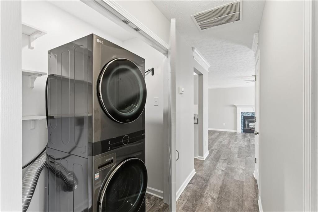 125 Governor Lane Temple, GA 30179 - Photo 40 of 57 a view of a storage & utility room with dryer and washer