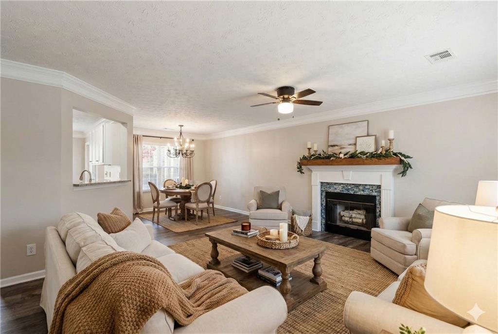 125 Governor Lane Temple, GA 30179 - Photo 10 of 57 a living room with furniture and a fireplace
