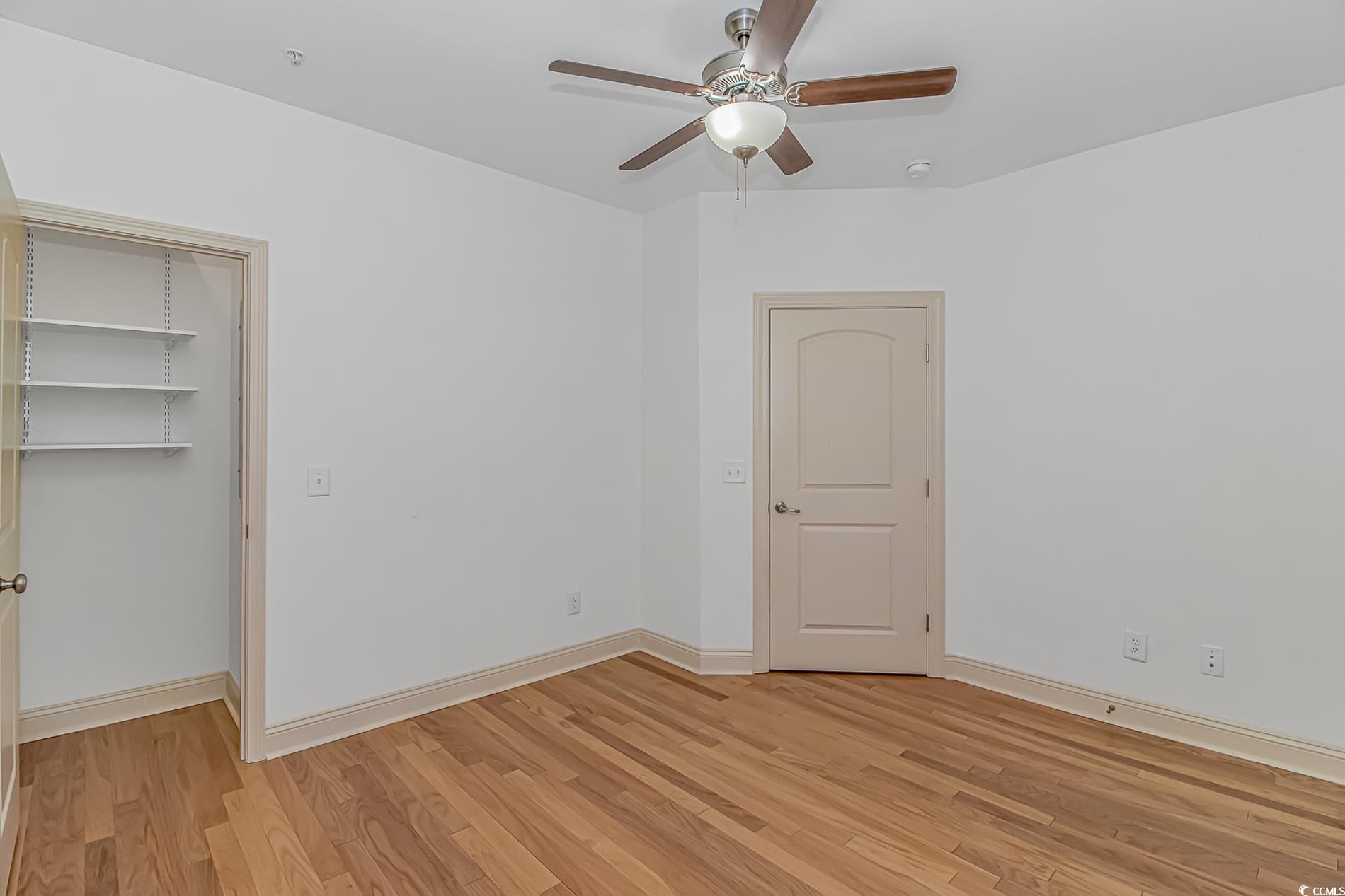 128 Puffin Drive, Unit 3A Pawleys Island, SC 29585 - Photo 10 of 30 bedroom with light wood-style floors and a ceiling fan