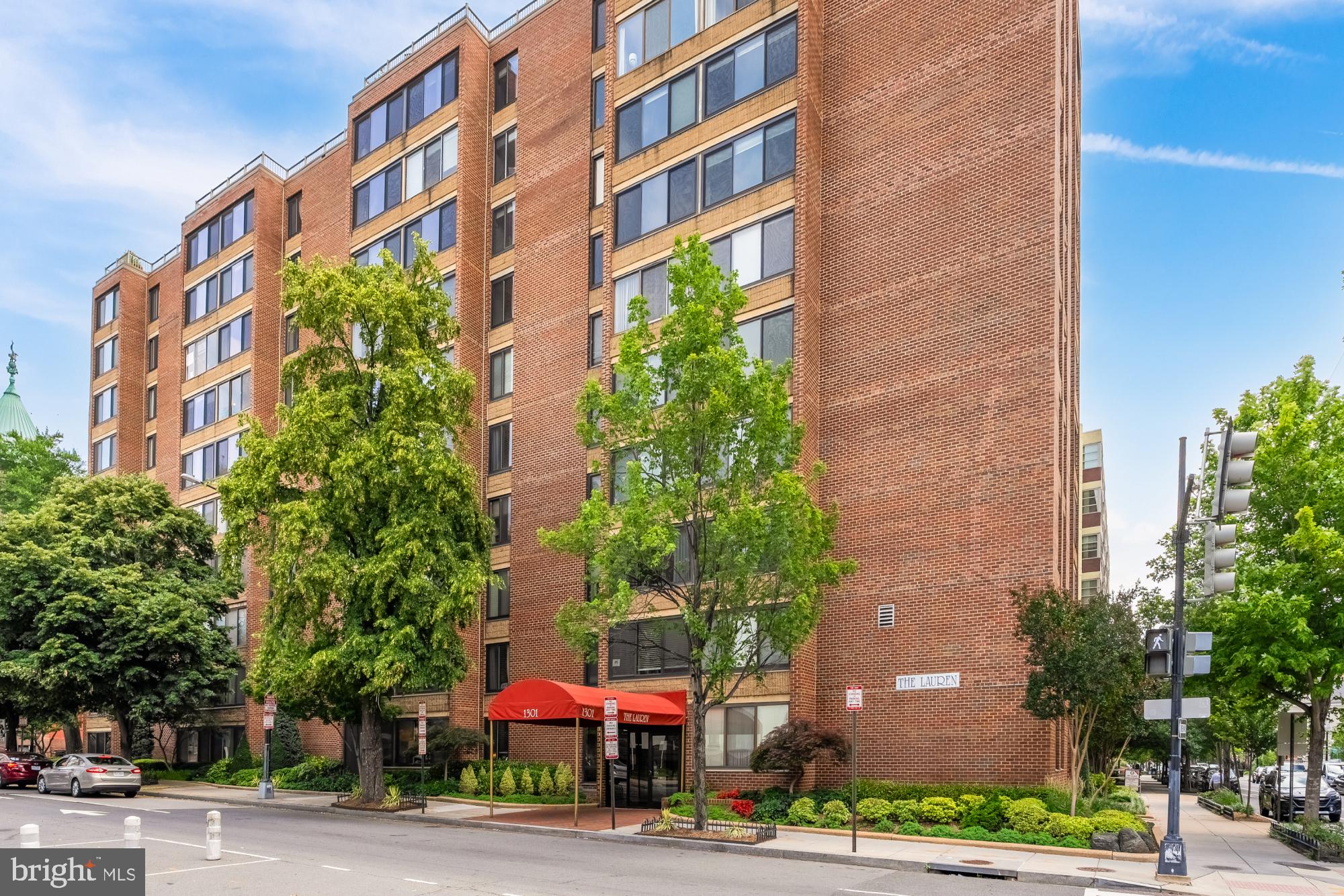 a view of a building with a street