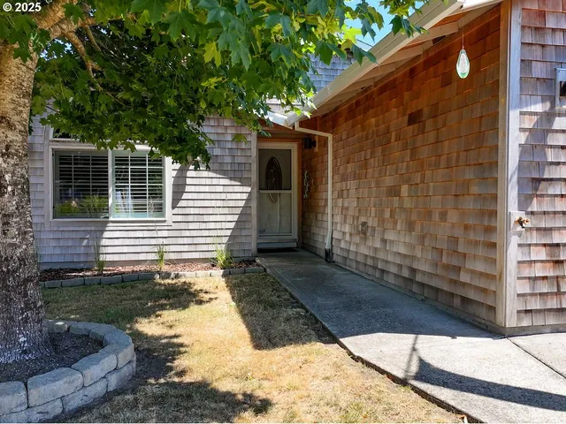 a view of a back yard of the house