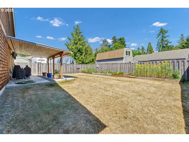 a view of a house with a street