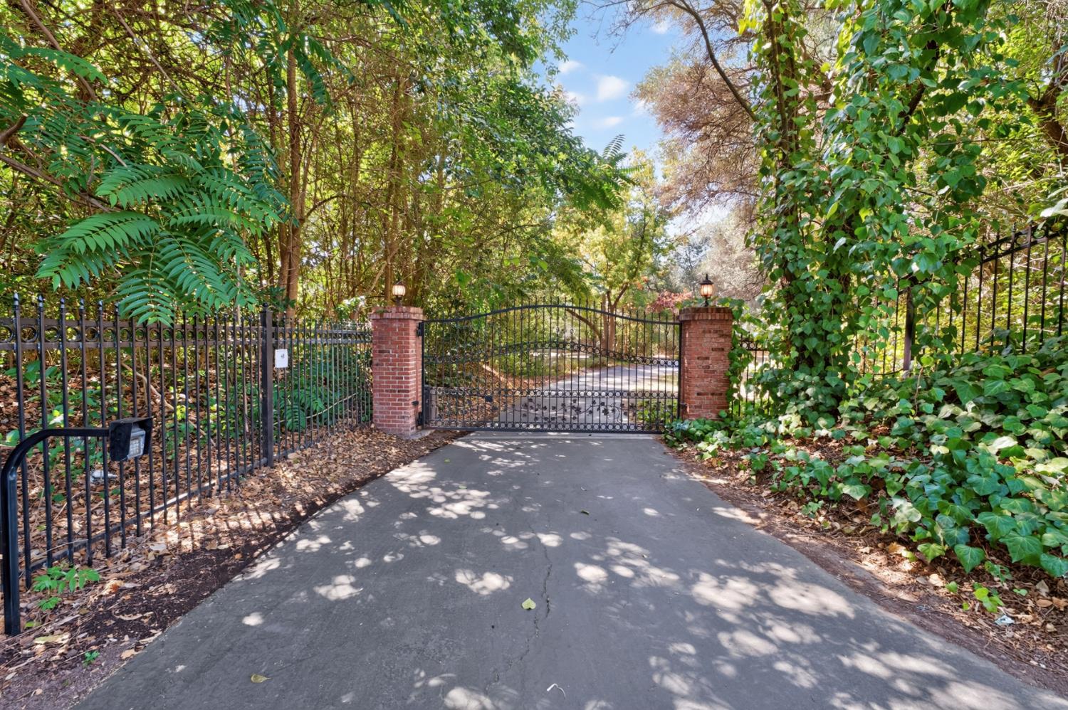 Private gated entrance welcomes you to this peaceful country estate.