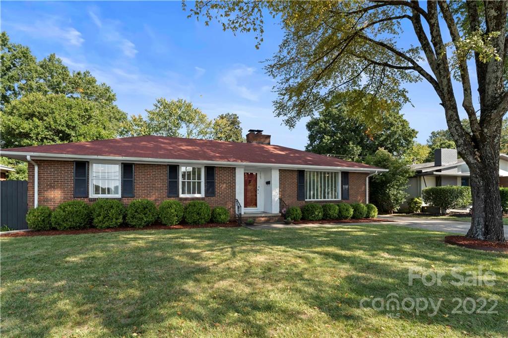 1705 Tyvola Road Charlotte, NC 28210 - Photo 2 of 40 front view of a house with a yard