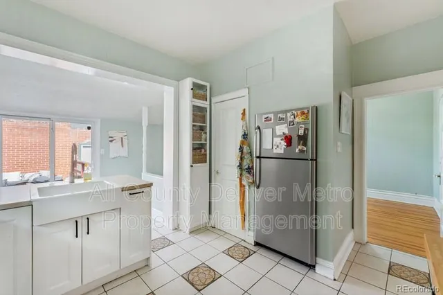 a room with a walk in closet and a view of bathroom