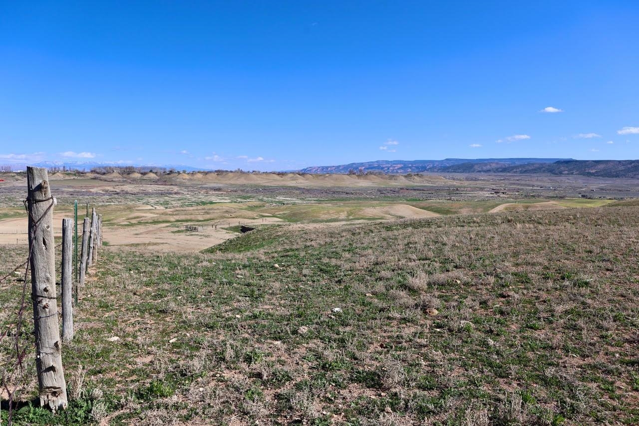 1777 9 Road Mack, CO 81525 - Photo 14 of 34 a view of a large building with an ocean view