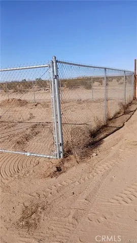 a view of a backyard of a house