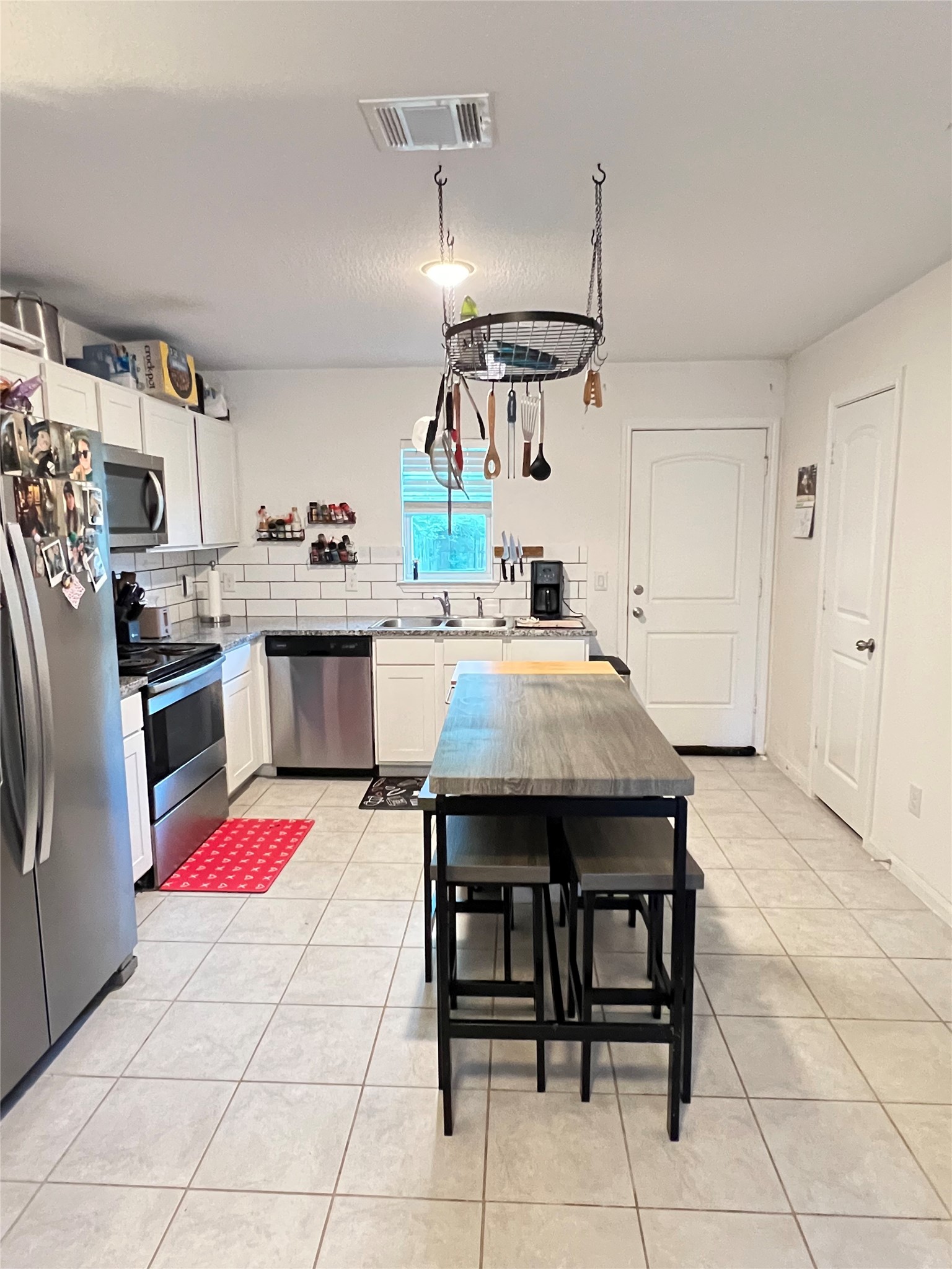 4139 Sam Houston Road Willis, TX 77378 - Photo 8 of 26 The kitchen has space for an island or breakfast table, your choice!