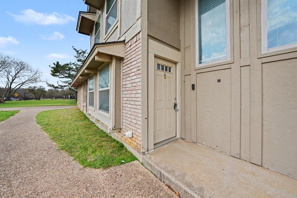 6925 Calender Road, Unit A Arlington, TX 76001 - Photo 5 of 19 a view of a house with backyard and garden