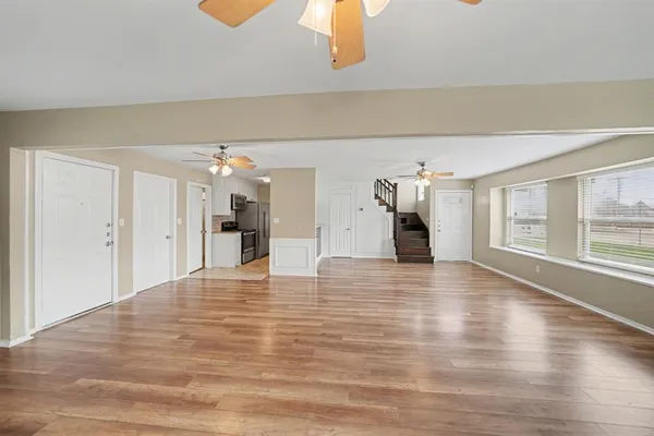 a view of a livingroom with wooden floor