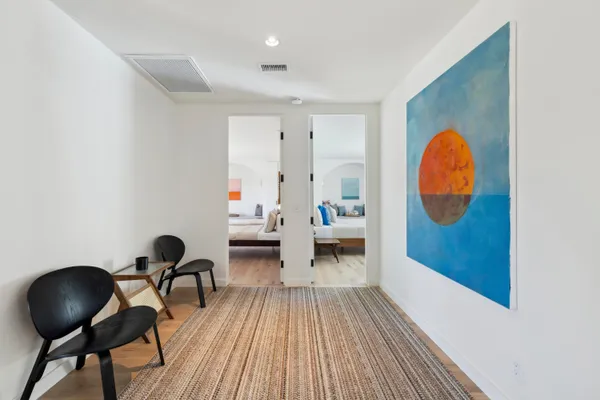 a view of a livingroom with furniture and entryway