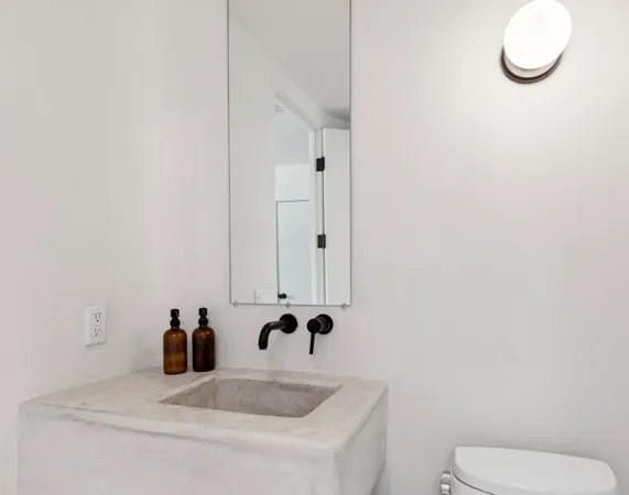 a bathroom with a tub and shower