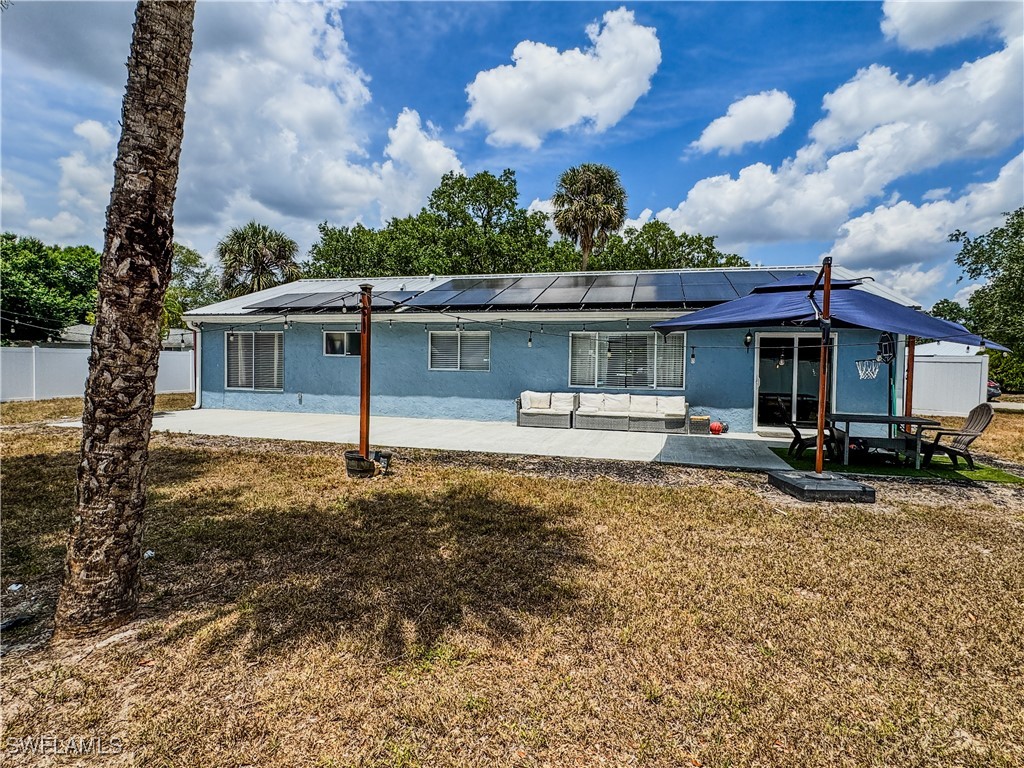 4002 Cascade Lane LaBelle, FL 33935 - Photo 3 of 23 a view of a house with backyard porch and sitting area