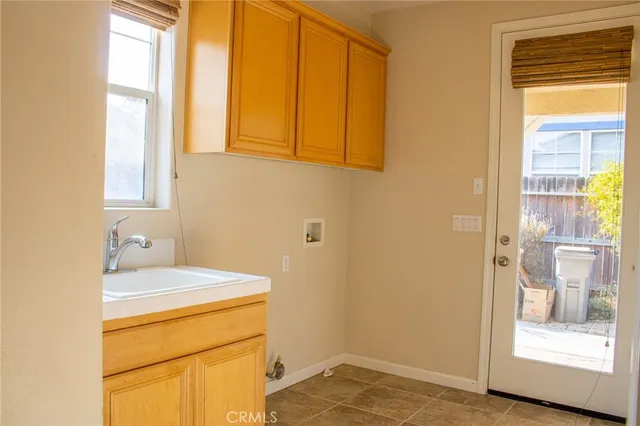 a view of a hallway with windows