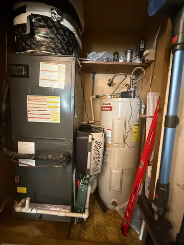 a living room with furniture dining room and a flat screen tv