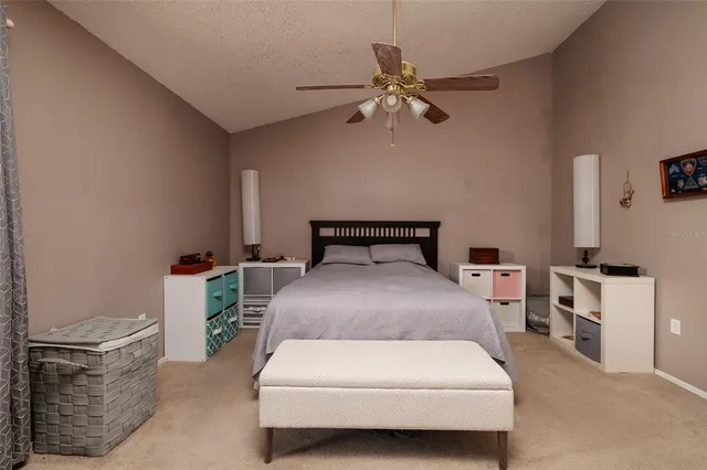 a bedroom with a bed and furniture