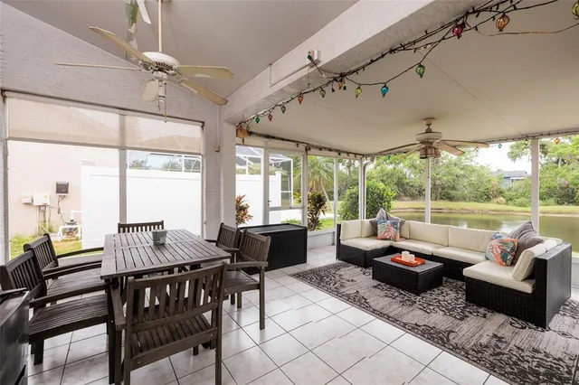 a dining room with furniture a window and kitchen view