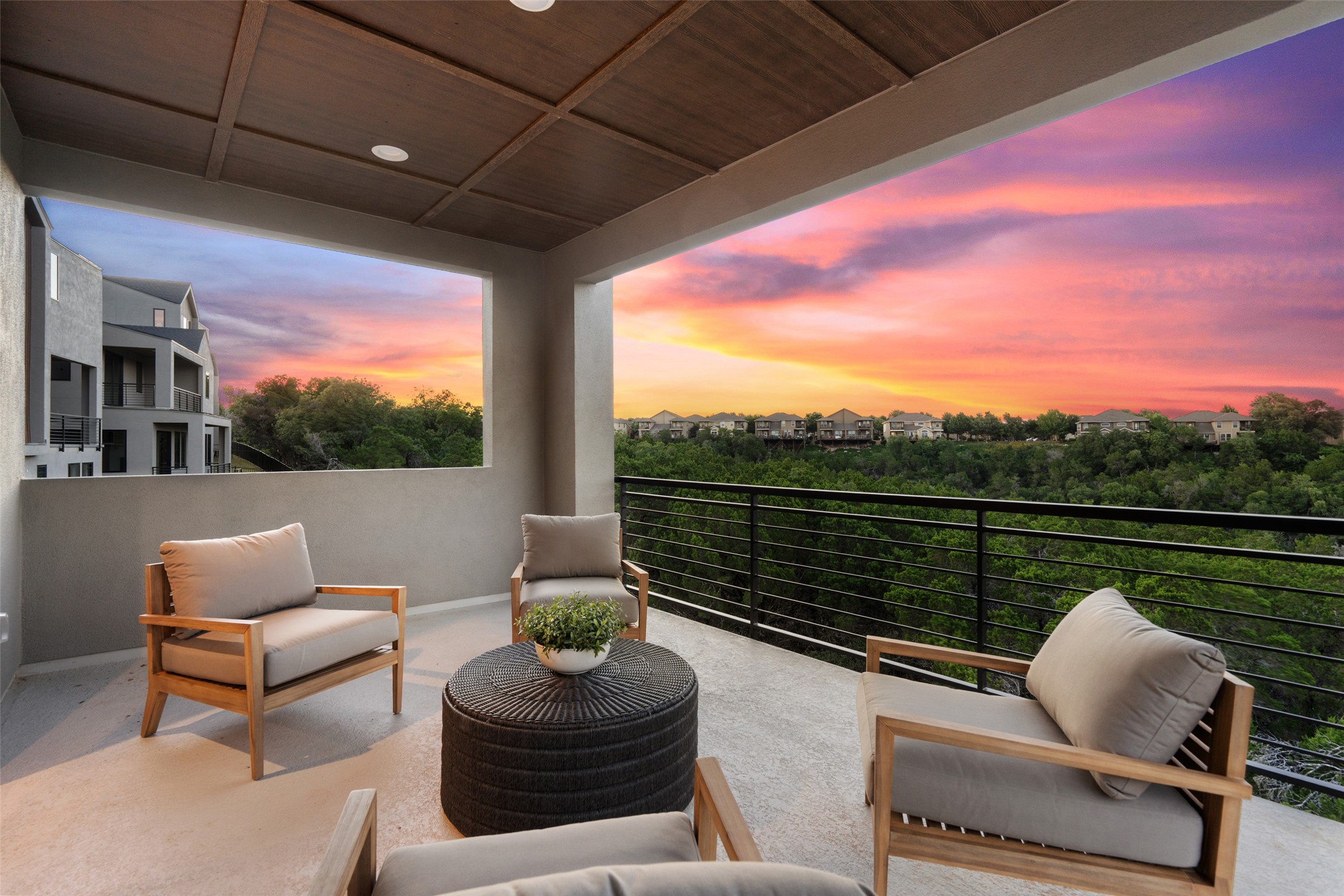 9803 Ribelin Ranch Court, Unit 6 Austin, TX 78750 - Photo 1 of 31 Unwind on this terrace, offering sweeping vistas of the neighborhood and captivating sunset views.