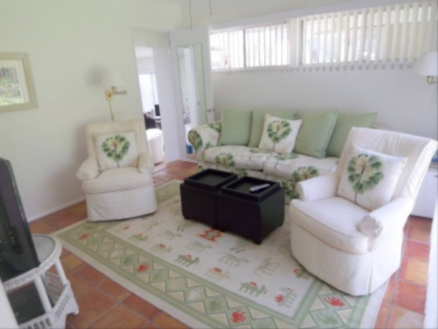 182 Cove Hollow Road East Hampton, NY 11937 - Photo 9 of 14 a living room with furniture and a couch