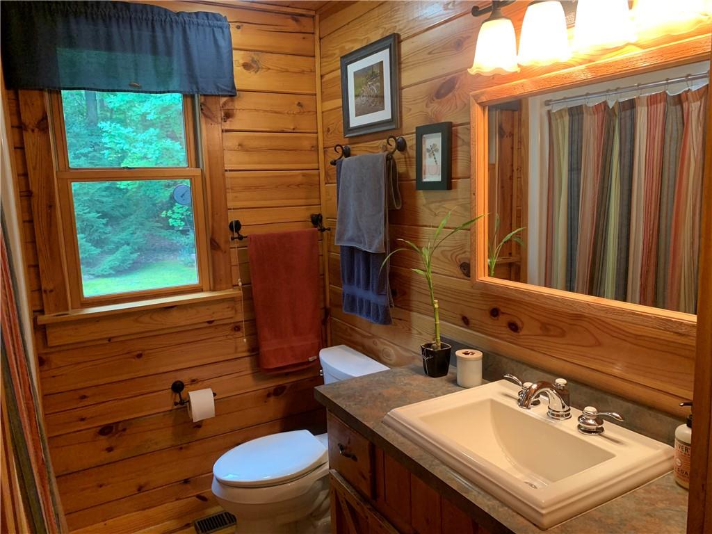 101 Cabin Road Normalville, PA 15469 - Photo 11 of 36 a bathroom with a sink a toilet and mirror