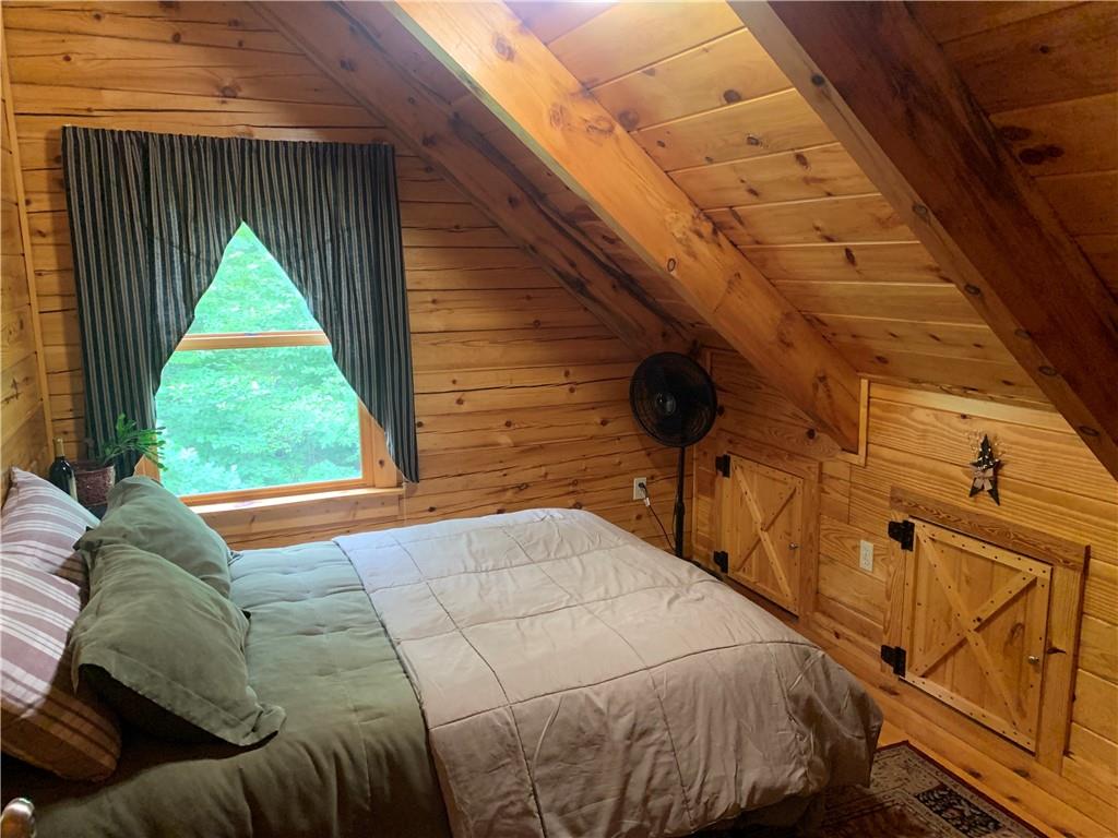 101 Cabin Road Normalville, PA 15469 - Photo 13 of 36 a bedroom with a bed and a window