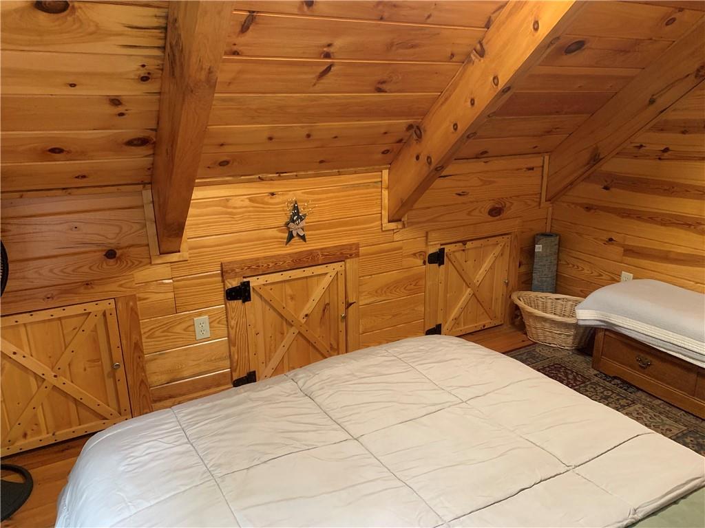 101 Cabin Road Normalville, PA 15469 - Photo 15 of 36 a bedroom with a bed and a cabinets
