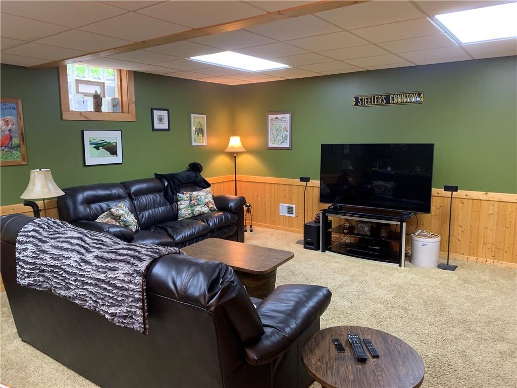 101 Cabin Road Normalville, PA 15469 - Photo 21 of 36 a living room with furniture and a flat screen tv