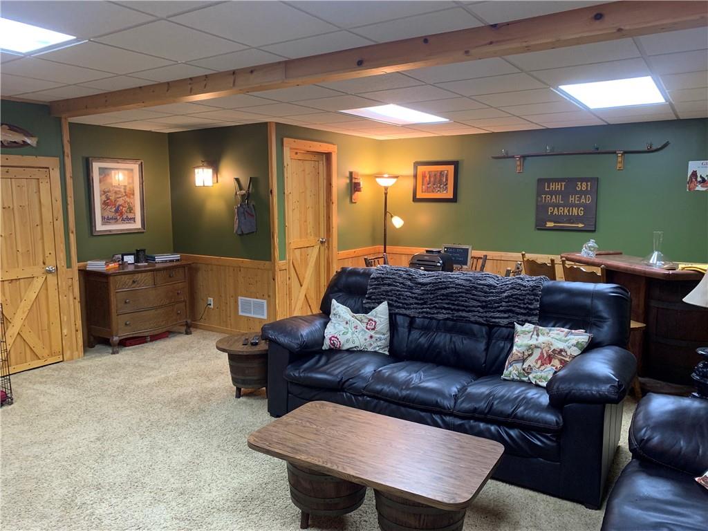 101 Cabin Road Normalville, PA 15469 - Photo 22 of 36 a living room with furniture and a mirror