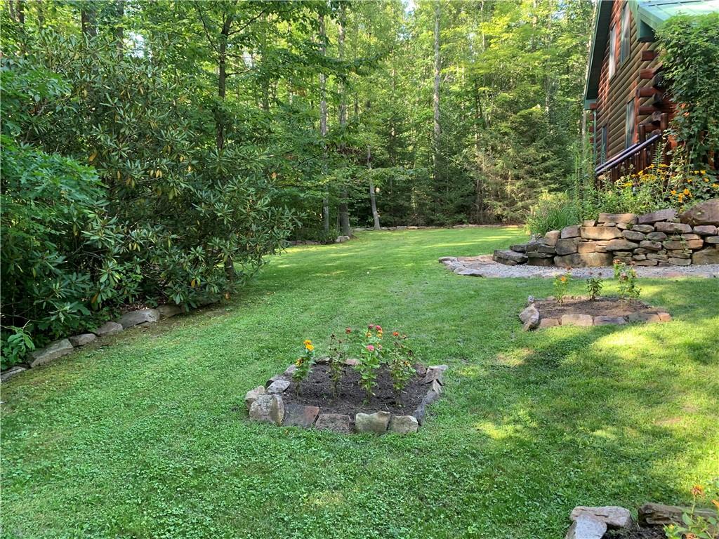 101 Cabin Road Normalville, PA 15469 - Photo 33 of 36 a view of a backyard with sitting area