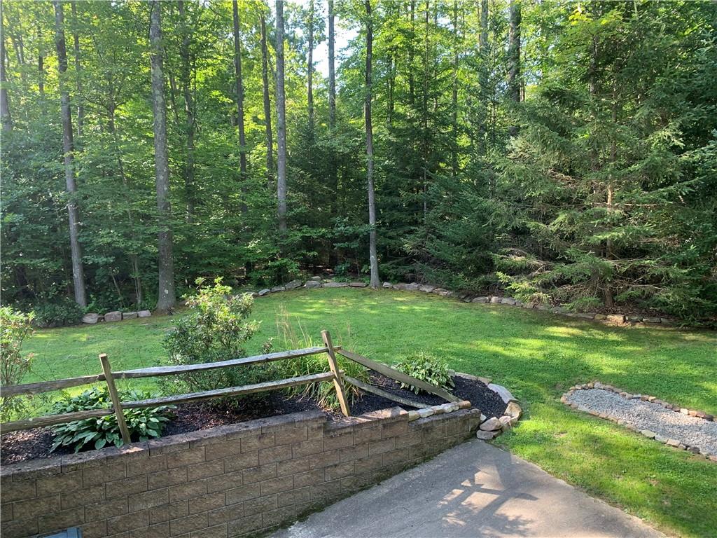 101 Cabin Road Normalville, PA 15469 - Photo 35 of 36 a garden view with a seating space