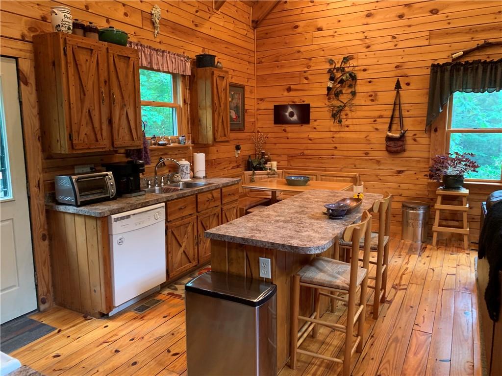 101 Cabin Road Normalville, PA 15469 - Photo 4 of 36 a kitchen with a sink a counter top space and appliances