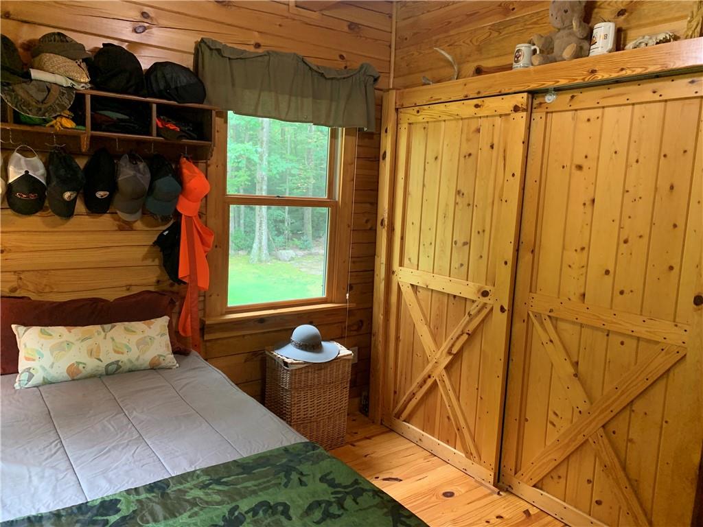 101 Cabin Road Normalville, PA 15469 - Photo 10 of 36 a view of walk in closet with clothes and shoes
